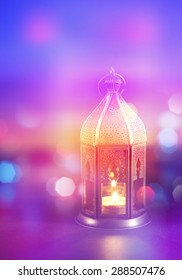 A festive Ramadan background. Abstract light effects with arabic lantern. Stock photograph.