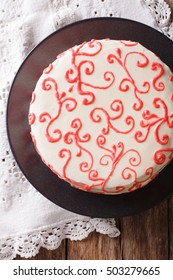 Festive Red Velvet Cake Close Up On The Table. Vertical View From Above
