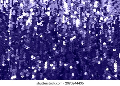 Festive sequin background in trendy purple 2022. Shining fabric background. - Shutterstock ID 2090244436