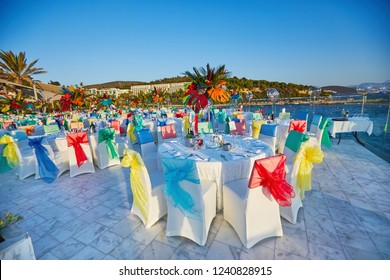 Festive served sea view terrace restaurant for corporate banquet or wedding