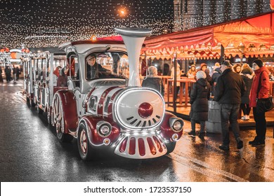 Festive steam train at the Christmas market. Ukraine, Kiev, January 9, 2020.