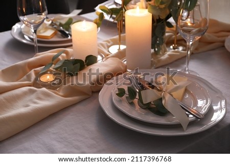 Festive table setting with beautiful decor and candles
