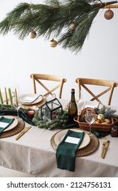 Festive Table Setting For Christmas Celebration In Dining Room