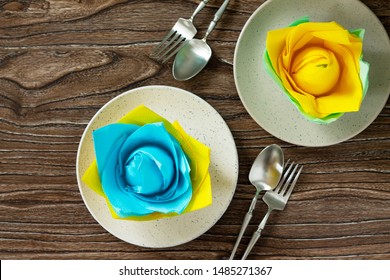 Festive table setting. Culinary background with napkin and empty stove on the kitchen table. Top view flat lay. 