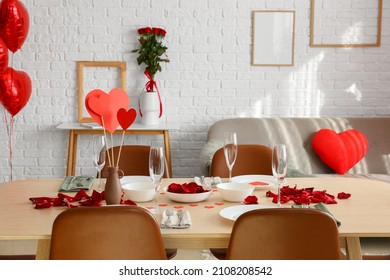 Festive table setting in dining room decorated for Valentine's Day