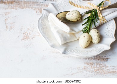 Festive Table Setting For Easter Dinner On Wooden Rustic Table