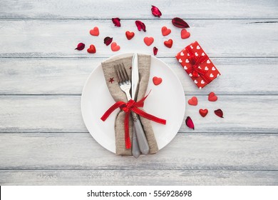 Festive Table Setting With Gift Box For Valentine Day. Top View 