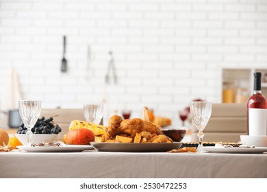 Festive table setting with tasty food for Thanksgiving Day in kitchen - Powered by Shutterstock