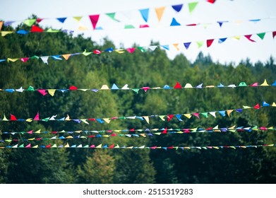 Festive triangular flags and ribbons at a city festival