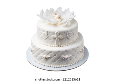 Festive White Cake Made Of Sugar Mastic, For The Baptism Of A Baby With Decorations Of A Doll, A Cross And Lipist Flowers