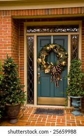 A Festively Decorated Front Door At Christmas