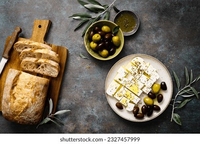 Feta cheese, olives and ciabatta, top view