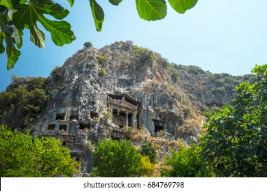 Fethiye rock tombs - 4th BC tombs carved in steep cliff. City of Fethiye, Turkey.