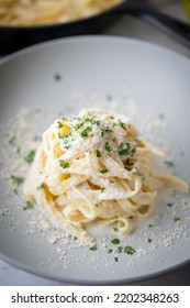 fettuccine alfredo, traditional cream cheese pasta - Shutterstock ID 2202348263