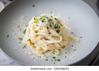 fettuccine alfredo, traditional cream cheese pasta - Shutterstock ID 2202348291