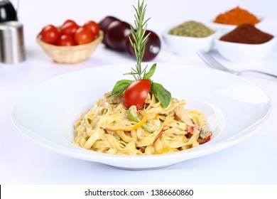 Fettucine Pasta White Cream Sauce In Plate