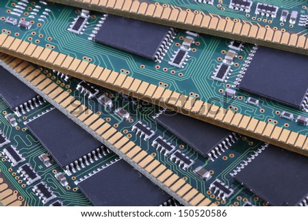 a few bars of computer memory lying on each other