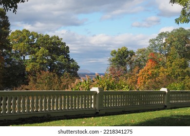 A Few Of The Fall Foliage From Behind The Fence. The Hudson River Is In The Background.