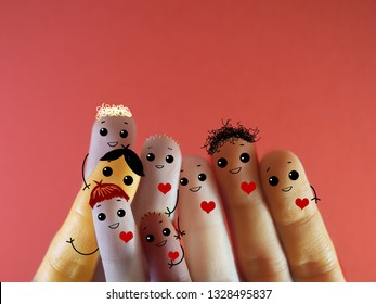 Few Fingers Decorated As A Group Of Friends Having Happy Gathering. They Have Different Skin Color But Are All Kind.