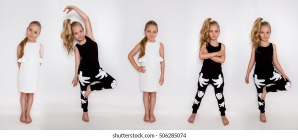 Few Pretty Sweet Girl With Blond Hair In A Ponytail With Long Hair In A Child Sportswear Looks At The Camera