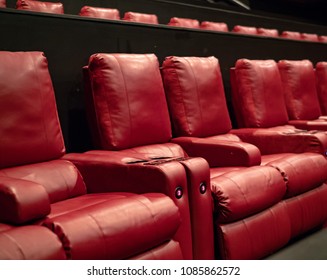 A Few Rows Of Recliner Movie Theater Seats In A Luxury Movie Theater