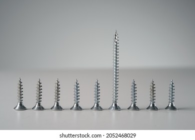 A few similar screws and different one - Shutterstock ID 2052468029