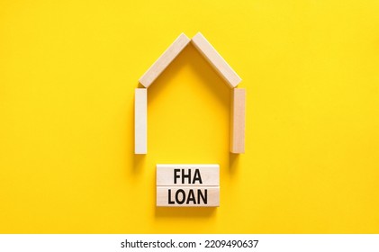 FHA Federal Housing Administration Loan Symbol. Concept Words 'FHA Federal Housing Administration Loan' On Wooden Blocks On A Beautiful Yellow Background. Business And FHA Loan Concept. Copy Space.