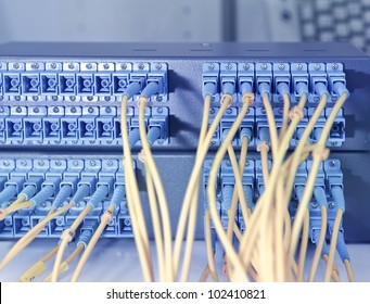 Fiber Cables Connected To Servers In A Datacenter