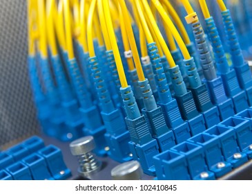 Fiber Cables Connected To Servers In A Datacenter