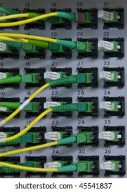 Fiber Cables Connected To Servers In A Datacenter