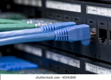 Fiber Cables Connected To Servers In A Datacenter