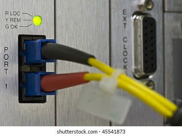 Fiber Cables Connected To Servers In A Datacenter