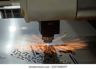 The fiber laser cutting machine cutting  machine cut the metal plate. The hi-technology sheet metal manufacturing process by laser cutting machine.  - Powered by Shutterstock