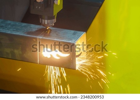 The fiber laser cutting machine cut the square stainless steel tube. The hi-technology sheet metal manufacturing process by laser cutting machine. 