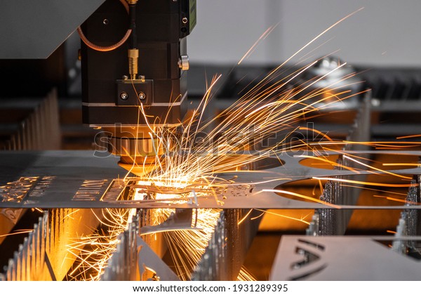 The fiber laser cutting machine cutting\
 machine cut the metal plate. The hi-technology sheet metal\
manufacturing process by laser cutting machine.\
