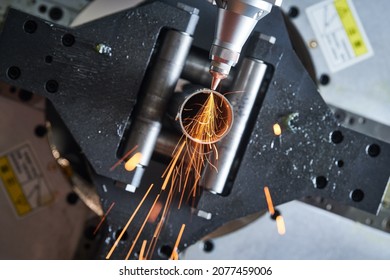 Fiber Laser Tube Cutting Machine. Metal Pipe Cutting With Sparks