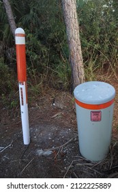 Fiber Optic Cable Marker And Pedestal In The Woods Near Rotonda West Florida USA  February 5th 2022.