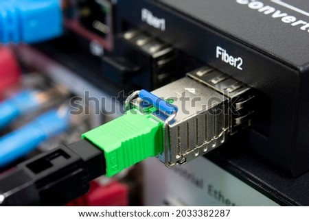 Fiber Optic cables and UTP Network cables. Optical Fiber communication Distribution point.