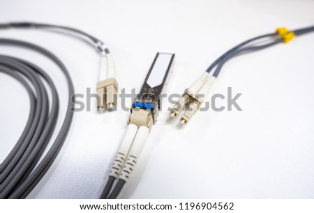 Fiber optic patchcords LC with transciever isolated on white background