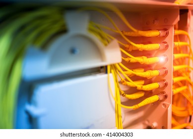 fiber optic with servers in a technology data center .