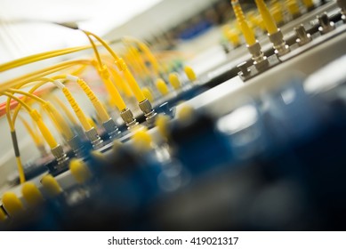 fiber optic with servers in a technology data center .