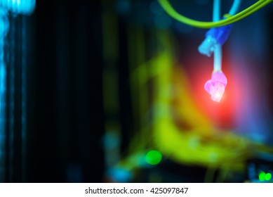 fiber optic with servers in a technology data center .