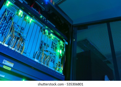 fiber optic with servers in a technology data center . - Powered by Shutterstock - Get 15% off with code: PIKWIZARD15