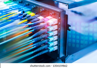 Fiber Optic Telecommunication Equipment And Patchcords Inside A Network Infrastructure