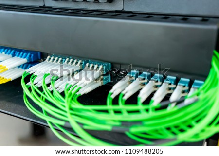 fiber optic telecommunication equipment and patchcords inside a network infrastructure