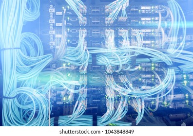 Fiber Optical connector interface. Fiber cable serve with technology style against fiber optic background. Severs computer in a rack at the large data center. has a small noise.