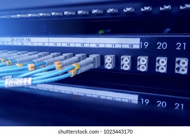 Fiber Optical connector interface. multiple exposure. Information Technology Computer Network, Telecommunication Fiber Optical Cables Connected. Data server. - Powered by Shutterstock - Get 15% off with code: PIKWIZARD15