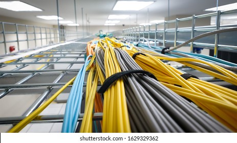 Fiber Optics Cable On Wire Way In Data Center Room