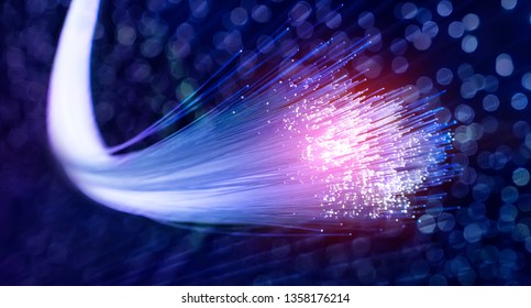 Fiber optics network cable lights abstract background - Shutterstock ID 1358176214