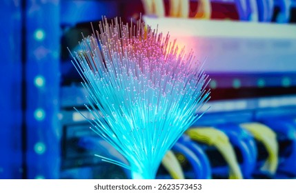 Fiber optics network cable on technology background